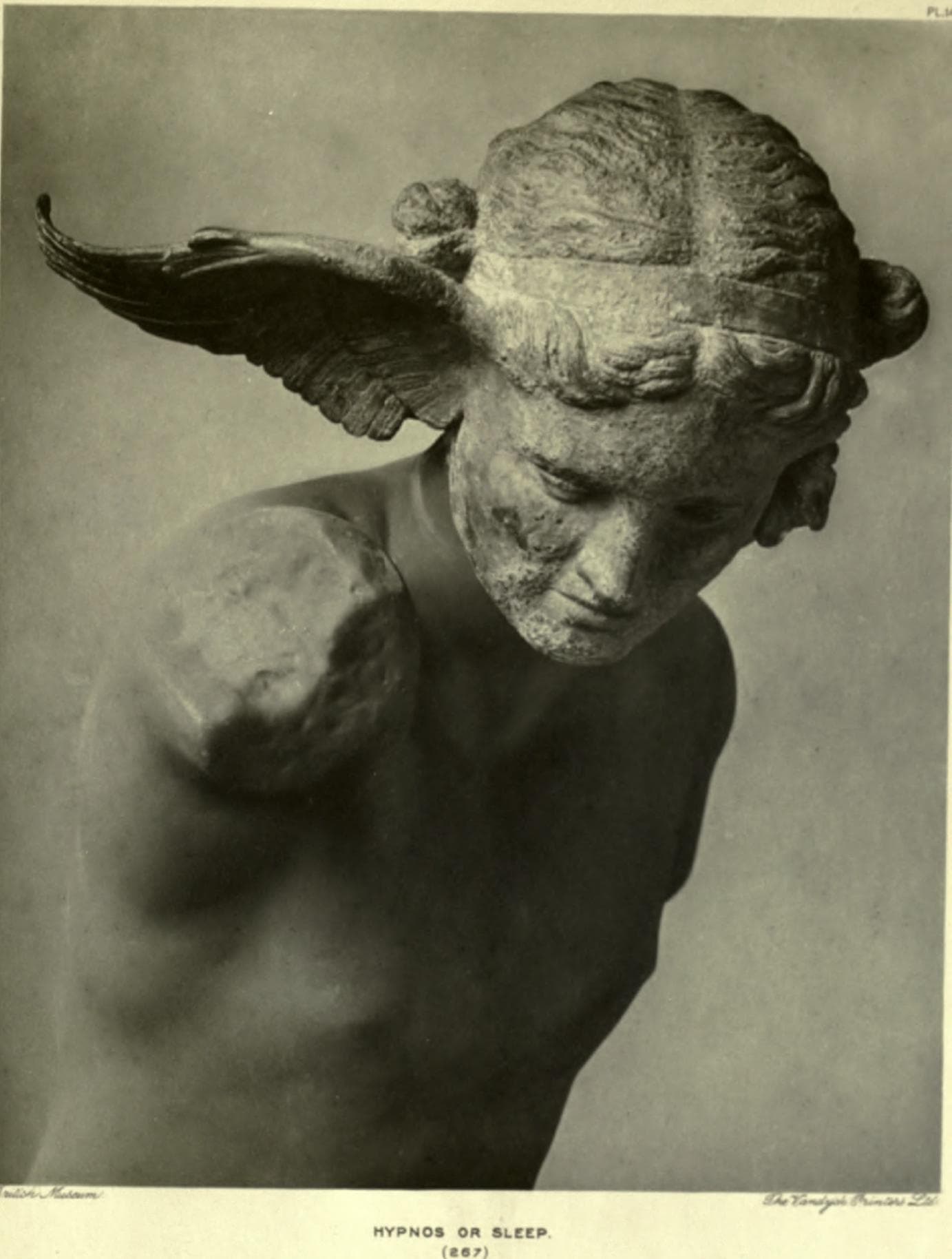 The bronze head of Hypnos in the British Museum, with a wing springing from the temple.