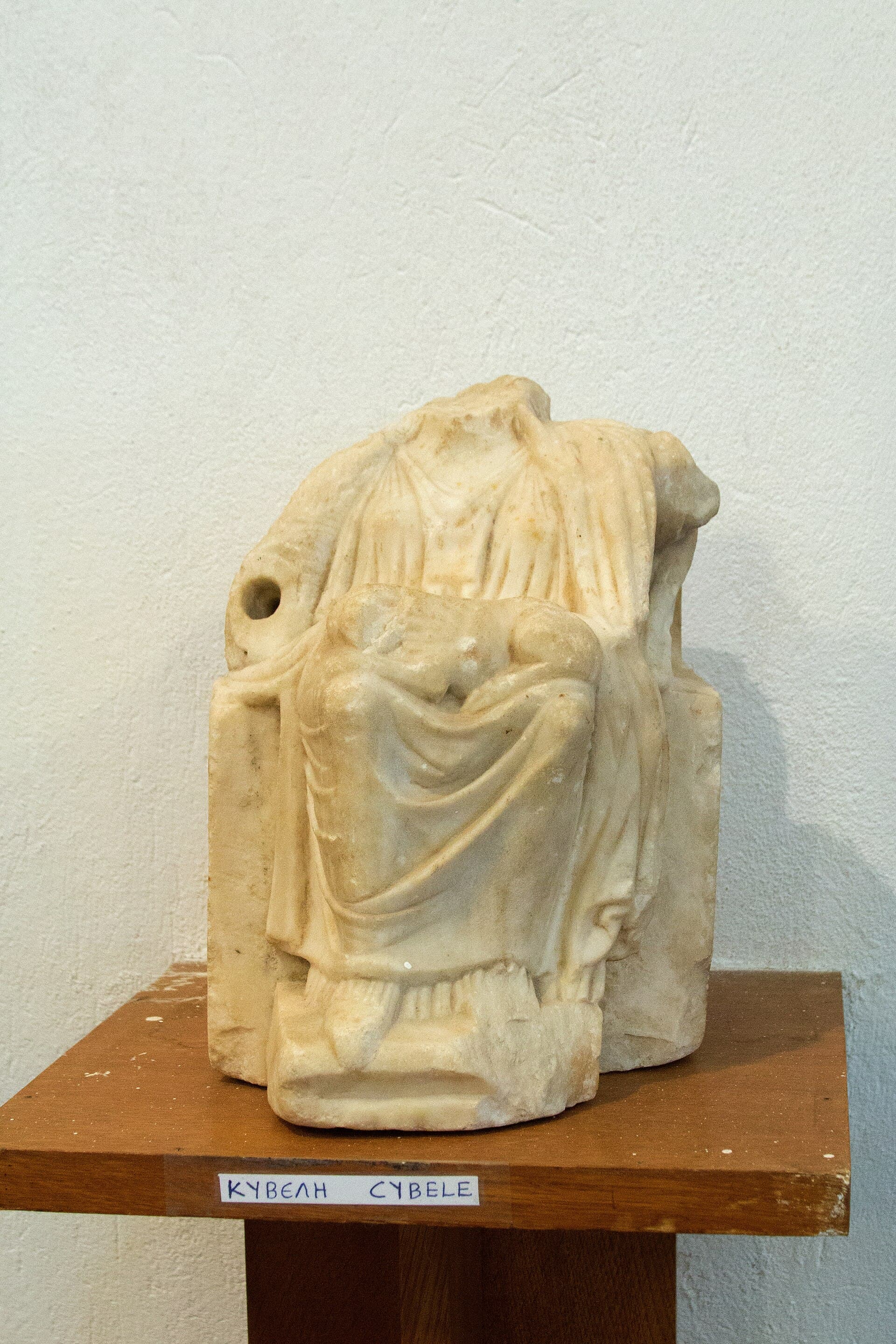 A Roman-period marble figure of Cybele, the mother goddess Greek cult identified with Rhea, from Naxos.