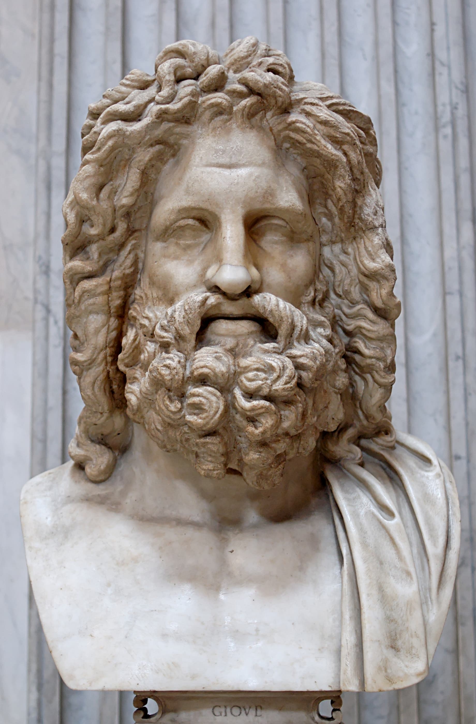 The Zeus of Otricoli: a colossal marble head of Zeus, bearded, with heavy hair falling from a central parting. A Roman copy after a Greek original.
