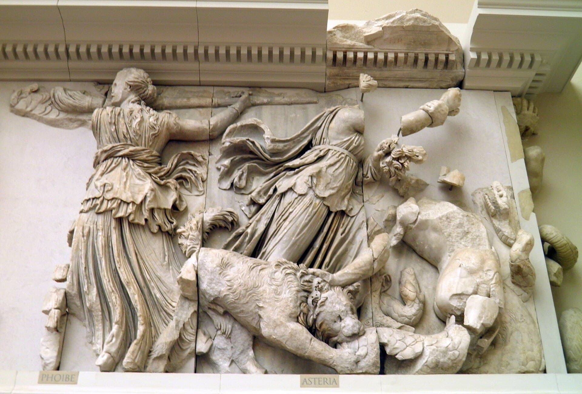 A section of the Gigantomachy frieze from the Pergamon Altar, carrying the figures identified as Phoibe and Asteria.